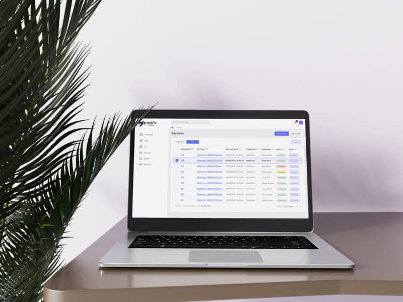 A laptop screen showing the GrackleDocs document remediation dashboard